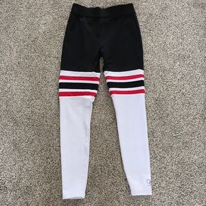 Bombshell Sportswear Black and White Leggings with Red Stripes